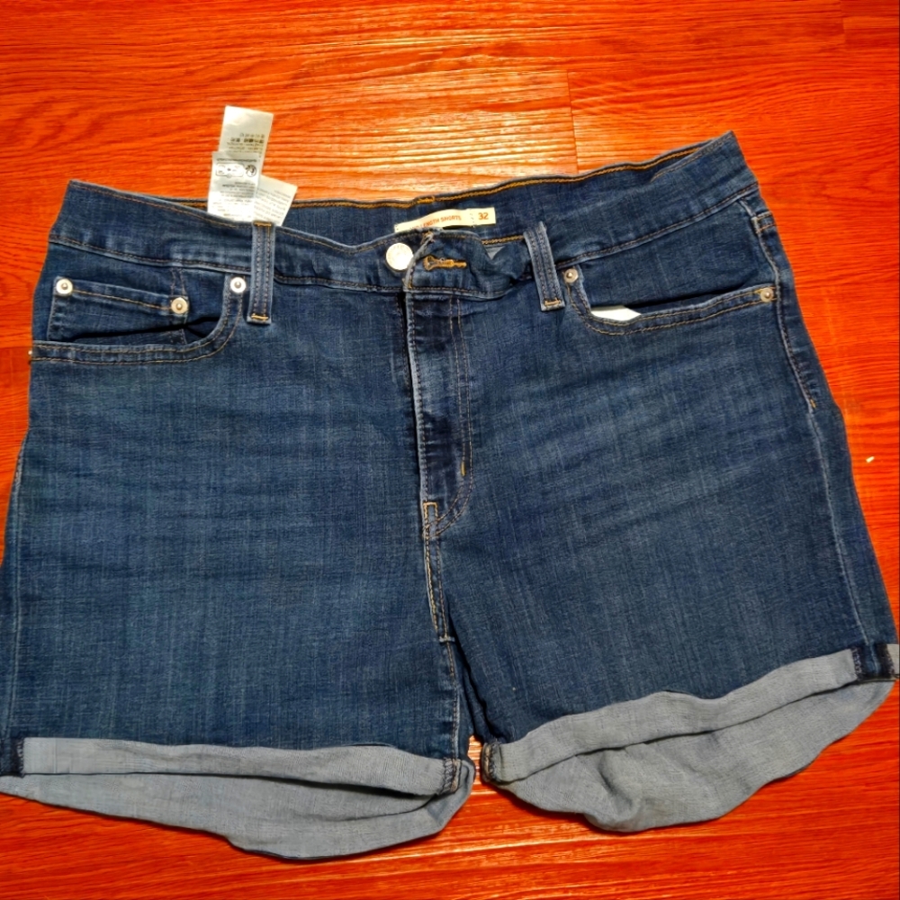 Levis Strauss mid length Jean shorts Size 32 rolled cuff hem